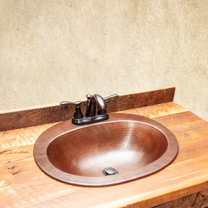 19 Copper sink two handled faucet